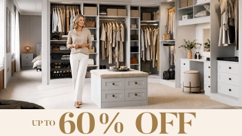 Woman in modern walk-in wardrobe with sale banner