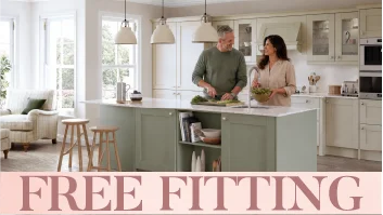 Couple preparing food in bright kitchen with free fitting banner