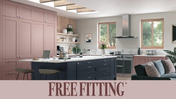 Modern kitchen with pink cabinets and blue island