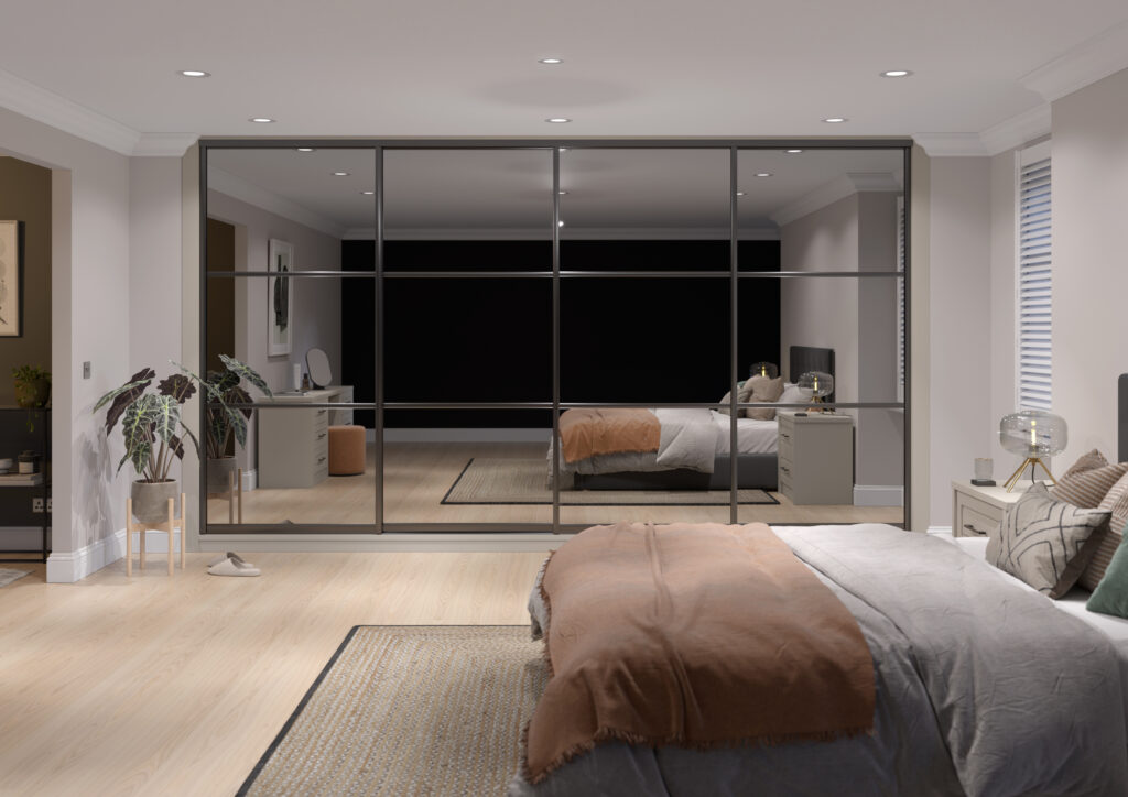 Modern bedroom with mirrored sliding wardrobe doors