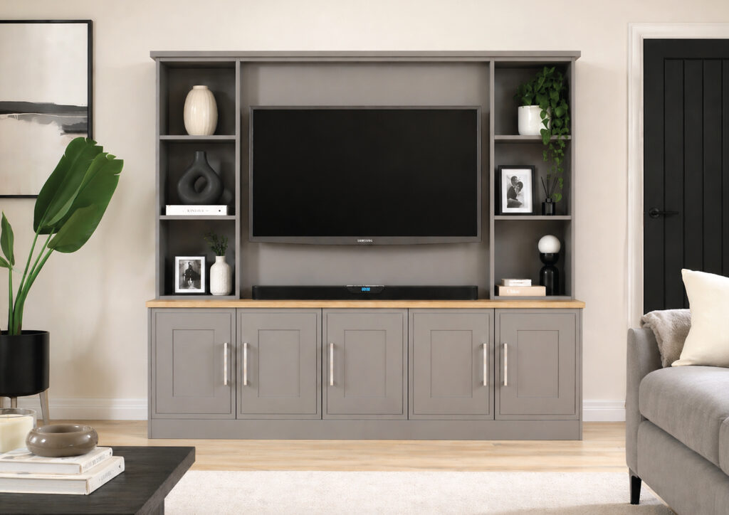 Modern grey TV unit with shelves and decor