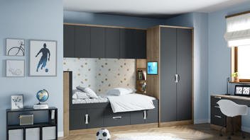 Modern blue bedroom with wall bed, desk and wardrobe